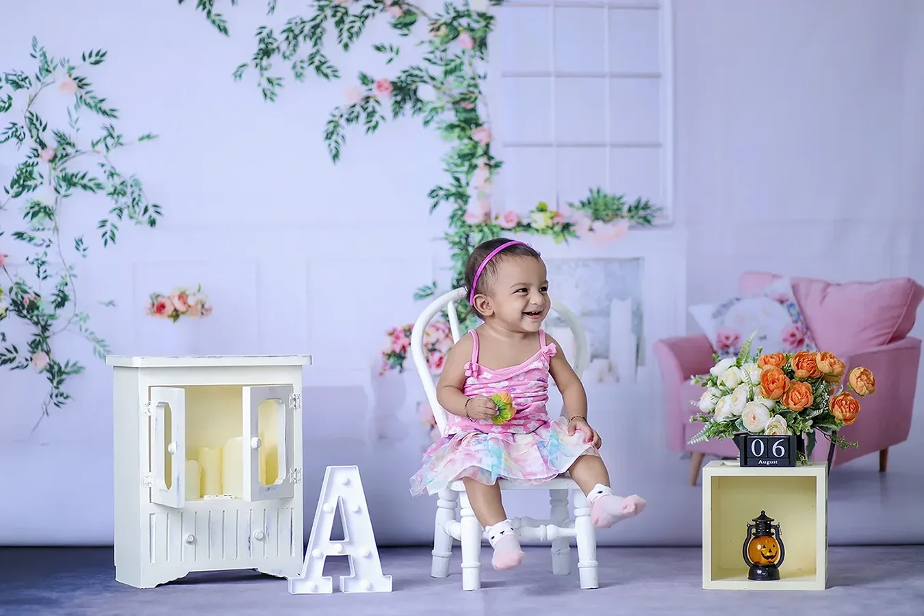 https://dx21q3b76hjv4.cloudfront.net/images/new/themes/pretty-living-room/baby-shoot.webp